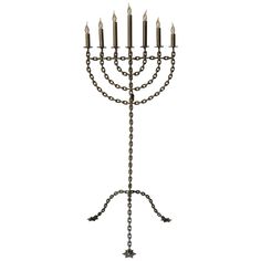 a large metal menorah with five candles