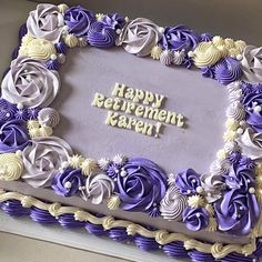 a purple and white cake with the words happy retirement written on it