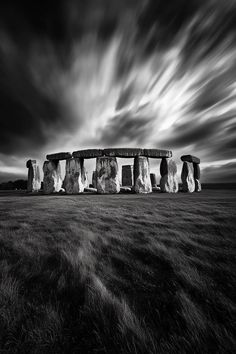 the stonehenge monument in england under a cloudy sky