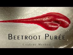 a close up of a red liquid on top of a metal surface with the words beetroot pure