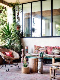 an image of a living room with couches and tables