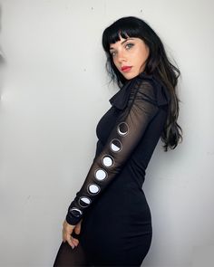 Black bodycon dress, with long mesh sleeves, ruffle shoulders, mesh back and moon phase printed on right arm. Moon lover? You need this last one piece. [as seen in the video] Our Thorn Black Denim with belt bag here ----> https://www.etsy.com/listing/1258119621/thorn-black-denim-jeans Celestial Goth Outfit, Fitted Witchy Mini Dress For Alternative Fashion, Witchy Fitted Mini Dress, Moon Goth Outfits, Witchy Fitted Long Sleeve Mini Dress, Fairycore Clothing, Witch Clothes, Moon Lover, Grunge Fairycore