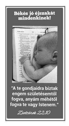 a black and white photo with a baby sleeping on it's back in front of an open book