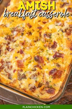 a cheesy casserole with bacon and cheese in a glass dish on a wooden table