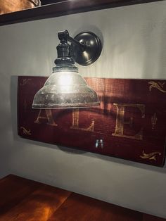 a lamp mounted to the side of a wall