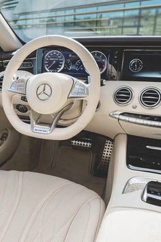 the interior of a mercedes s - class sedan, with its dashboard and instrument controls