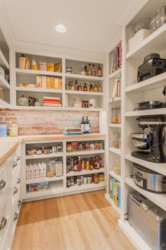 an open pantry with lots of food in it