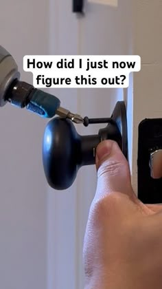 a hand holding a drill and pointing at the door handle with text overlay that reads, how did i just now figure this out?