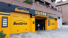 the entrance to best drive is yellow and black