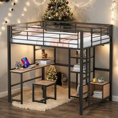 a bunk bed with a desk underneath it and christmas lights on the wall behind it