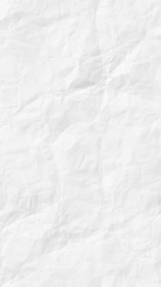 white crumpled paper textured background with space for text or image