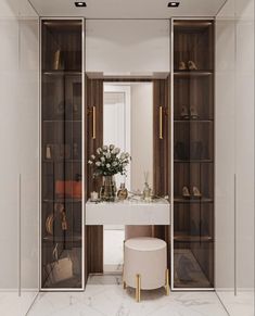 a bathroom with a vanity, mirror and shelves filled with purses on top of it