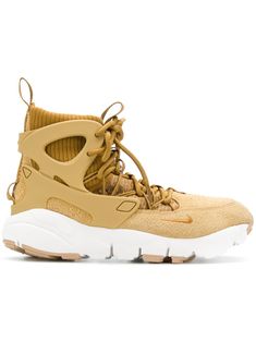 Beige suede Air Footscape Mid sneakers from Nike featuring a round toe, a pull tab at the rear, a sport sock style, a lace-up front fastening, a ridged rubber sole and rubber panels. Nike Footwear, Mid Sneakers, Designer Trainers, Balenciaga Triple S, Lacing Sneakers, Sole Shoes, Sneakers Men Fashion, Fashion Socks, Nike Sneakers