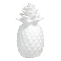 a white ceramic pineapple on a white background