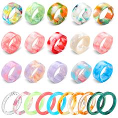 many different colored rings are shown together