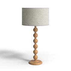 a wooden table lamp on a white background