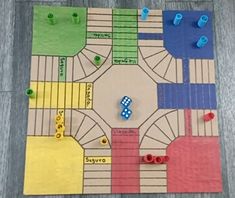 a board game with cars and numbers on it