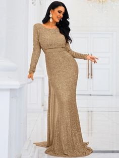 Jeweled and sophisticated, this gold sequin dress exudes timeless elegance. The long sleeves provide a modest yet stylish touch, while the fitted waistline flatters your figure. The floor-length skirt flows gracefully, making it ideal for black-tie events and formal occasions. The shimmering sequins ensure you capture the light from every angle, making you the center of attention. This gown is crafted from high-quality materials, ensuring both comfort and durability. Perfect for a gala, wedding, Sequin Mermaid Dress, Champagne Prom Dress, Sequin Evening Dress, Mermaid Prom Dress, Gold Sequin Dress, Elegant Heels, Sequin Evening Dresses, Full Length Skirts, Maxi Dress Prom