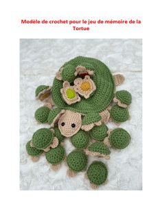 there is a crocheted stuffed animal in the shape of a turtle