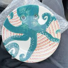 a plate with an octopus painted on it