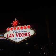 the welcome to fabulous las vegas sign lit up at night