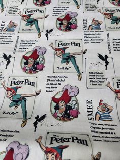 an image of disney characters on white fabric