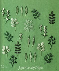 the japanese lovely crafts book is filled with embroidered flowers and leaves, all in green