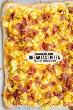 a close up of a pizza with bacon on it's crust and the words cracker out breakfast pizza