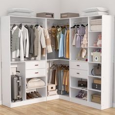 an open closet with clothes and suitcases on the floor next to a white wall