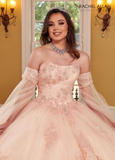 Make a grand entrance in this long strapless dress with A-line skirt by Rachel Allan RQ3110. Strapless glitter tulle and lace quinceanera ball gown with ruched bodice, sequined embroidery applique, scallop train, back lace up closure, and a detachable royal scallop train. Glitter Lace Strapless Quinceanera Dress by Rachel Allan RQ3110 Rachel Allan Alta Couture Collection: Spring 2023 Style Number: RQ3110 Fabric: Glitter Lace, Glitter Tulle, Sequin Embroidery, Beading Please note: There may be a Long Strapless Dress, Rachel Allan Prom Dresses, Quinceanera Dresses Pink, Dresses Quinceanera, Rachel Allan, Quinceanera Dress, Lace Strapless, Prom Looks, Ruched Bodice