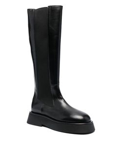 Calf-length leather boots from WANDLER featuring black, calf leather, elasticated side panels, round toe, flat rubber sole and calf-length. Imported Outer: Calf Leather 100% Lining: Calf Leather 100% Sole: Rubber 100% FINAL SALE Elastic Boots, Long Boots, Side Panels, Panel Siding, Rubber Rain Boots, Riding Boots, Calf Leather, Leather Boots, Final Sale