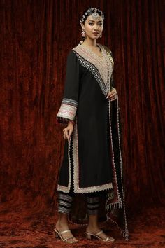 Black kurta in silk chanderi base with pearl, badla, kasab work and maroon lace trims on border, neckline and cuffs. Comes with a matching silk chanderi pant and floral pattern dupatta with gota, dori and crystal drop detailing. - Aza Fashions Black Kurta, Maroon Lace, Lace Trims, Kurta With Pants, Crystal Drop, Pants Pattern, Set For Women, Aza Fashion, Lace Trim