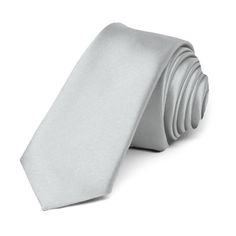 This light silver premium tie is cut in our skinniest and trendiest 2-inch width. Its heavyweight woven material and smooth satin finish provides a sharp look that is suited for your most formal occasions.We recommend this shade for a light gray color. Product Features • Skinny 2" width, at the widest point • 57" length, tip to tip• Color is light silver • Made from 100% Polyester Microfiber • Smooth, satin finish • Imported Silver Tie, Tie Women, Shop Light, Grey Tie, Wedding Ties, Summer Suits, Wedding Inspirations, Color Swatch, Wedding Board