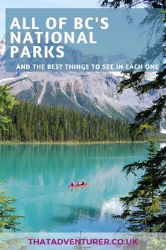 two people in a boat on a lake surrounded by trees and mountains with snow capped peaks