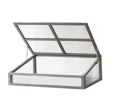 an open metal box with glass sides on a white background, showing the bottom section