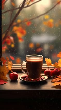 a cup of coffee sitting on top of a window sill next to autumn leaves