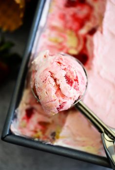 a scoop of ice cream sitting on top of a table