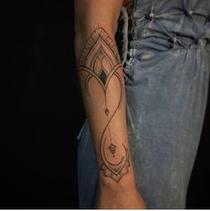 a person with a tattoo on their arm