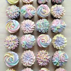 cupcakes decorated with pastel colors and flowers