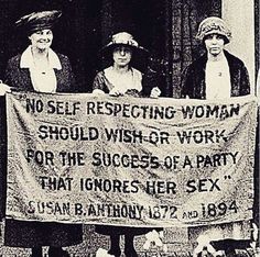 an old black and white photo of people holding a sign that says no self - respected women should wish to work for the success of a party