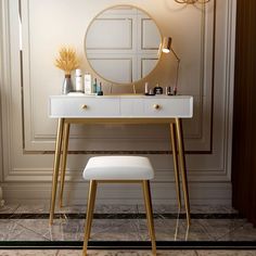 a vanity with a mirror and stool in front of it