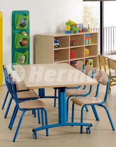 children's table and chairs in a playroom