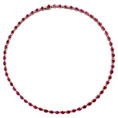 Ruby and diamond line necklace Choker in 18 carat white gold setting. It is composed of 60 rubies of oval cut alternated with 2 diamonds each diamond weighing approximately 0.01 carat. Total weight of the 60 rubies: 25.9 carats. Total weight of the 120 diamonds : 1.30 carat. Length: 44cm, width: 4mm Gross weight: 25.9g. Eagle's head hallmark. French work Tongue clasp with 2 safety eights. Ruby Choker, Ruby And Diamond Necklace, Ruby Necklace, Eagle Head, Necklace Choker, Girls Best Friend, Oval Cut, Diamond Necklace, Choker