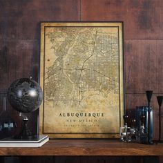 a framed map is sitting on a table