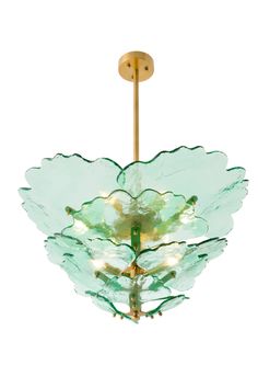 a green glass chandelier hanging from a ceiling