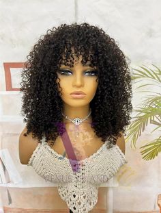 Introducing our super curly wig with bangs. The picture displays a length of 18" or 45 cm (when stretched). Made from 100% virgin human hair.  This wig is not only high quality, but also incredibly natural-looking and easy to style. The cap will be enhanced with a "fake scalp" (lace part in the middle) for a seemless and more natural look. Product Specifications: Brand:  Venus Island Texture:  Curly Density:  Available in 200 % or 180% (on picture wig has 200% hair density) Colour:  Natural Blac Black Hair Types, Picture Displays, Bang Wig, Curly Wig With Bangs, Curly Bangs, Custom Wigs, Wig With Bangs, Amazing Hair, Curly Wig