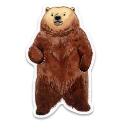 a brown bear sticker sitting on top of a white surface