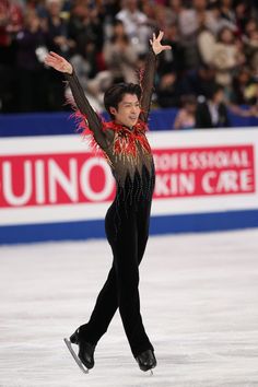 an olympic figure skating in front of a crowd