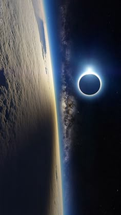 an eclipse is seen over the earth from space