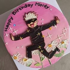 a birthday cake with a cartoon character on it